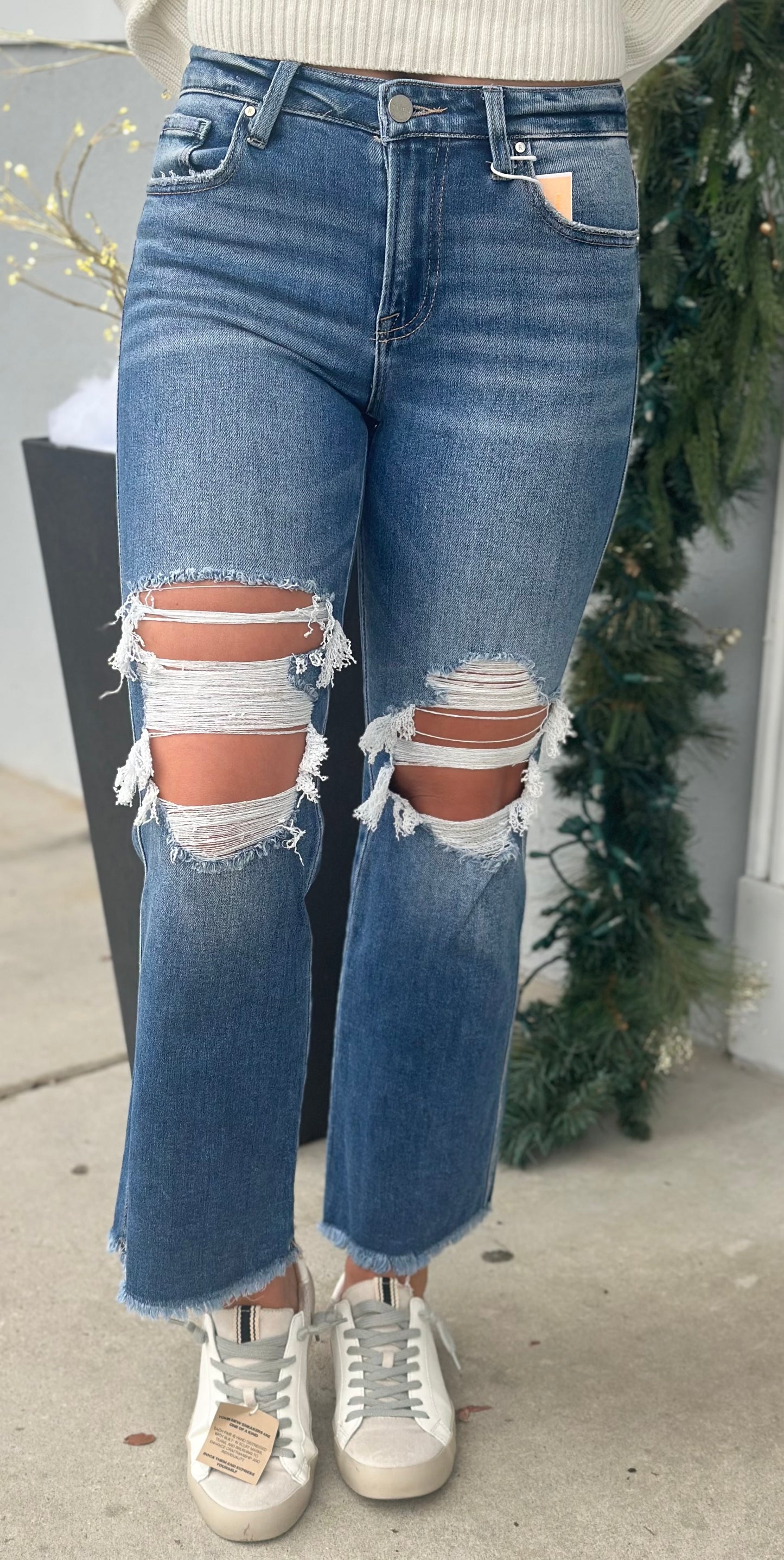 Medium Mid Rise Crop Flare Distressed Jeans