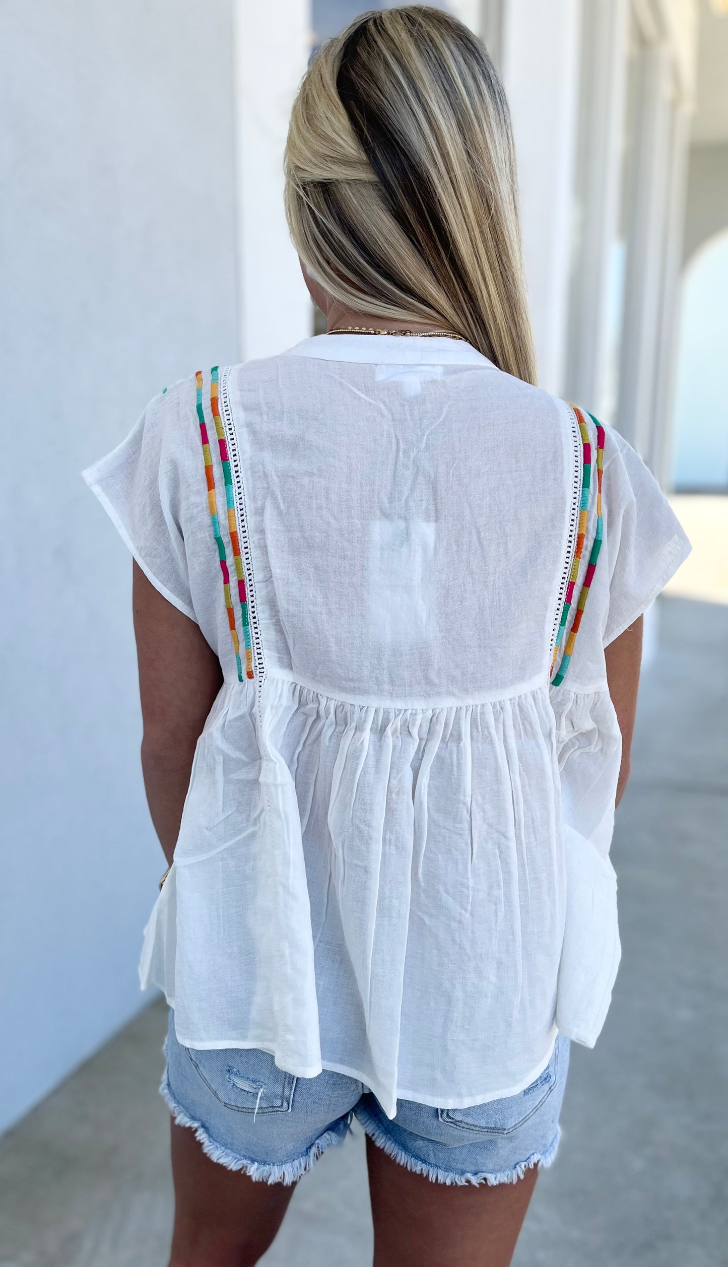 Embroidered Babydoll Tassel Tie Top