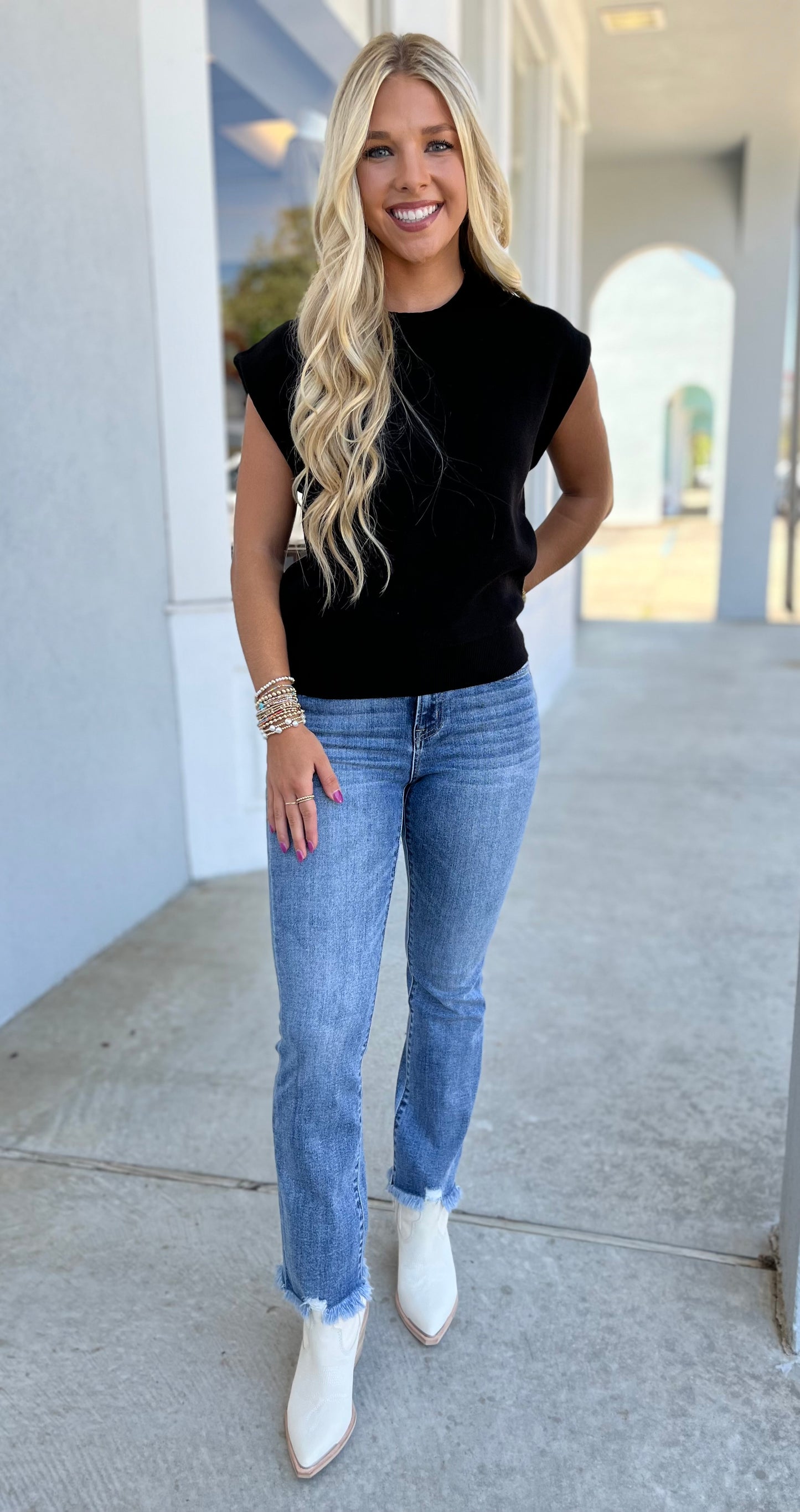 Black Sleeveless Sweater Top