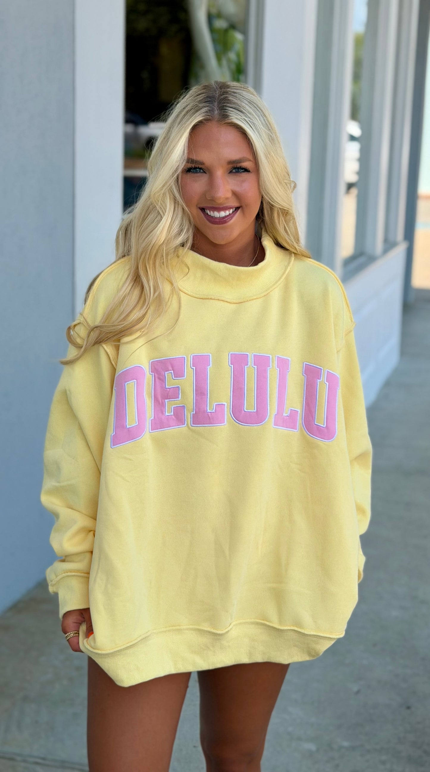 Delulu Embroidered Mock Neck Sweatshirt